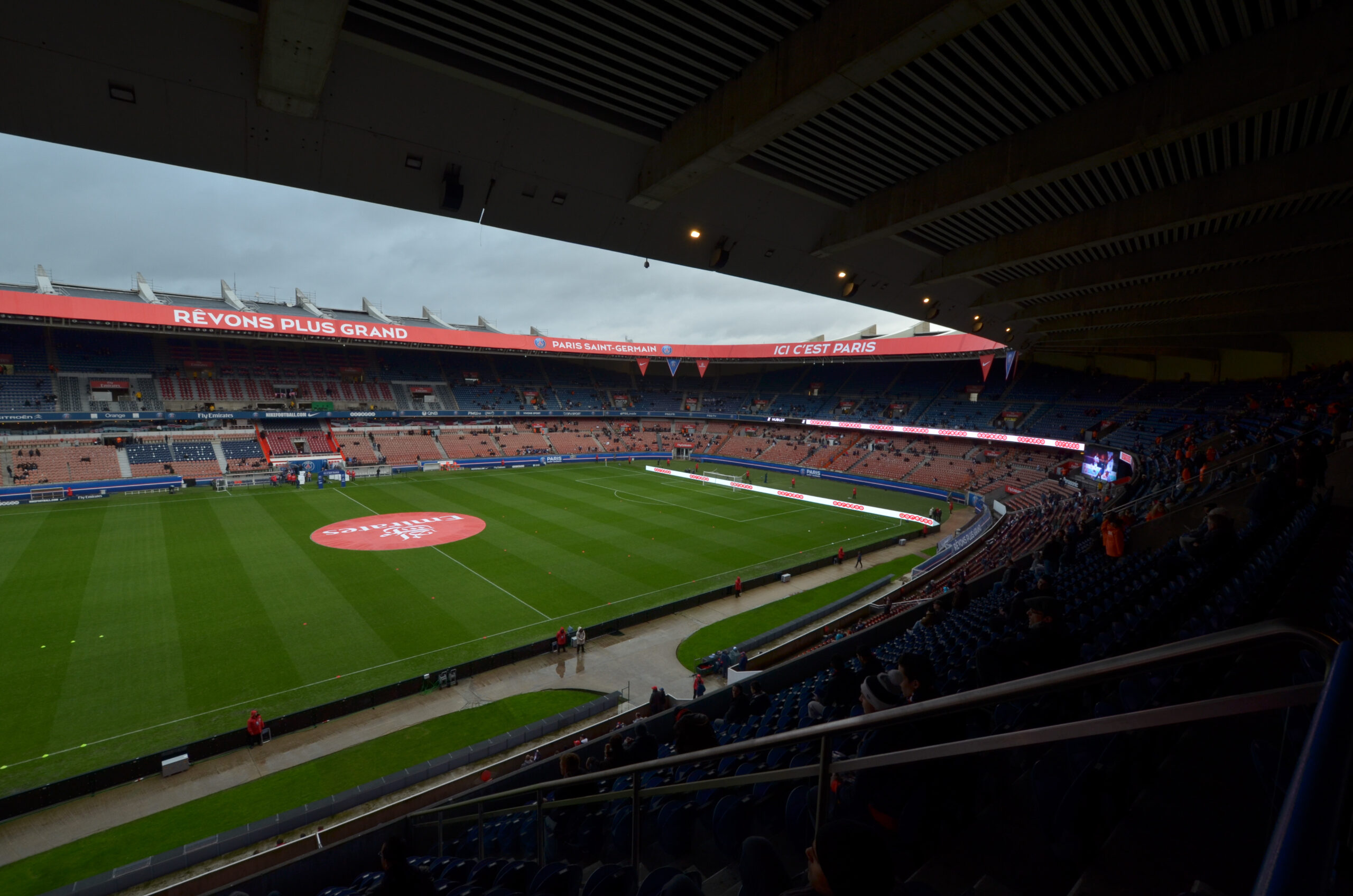 Archive photograph of the Parc des Princes, viewed from beneath the roof towards the pitch and opposite stands.